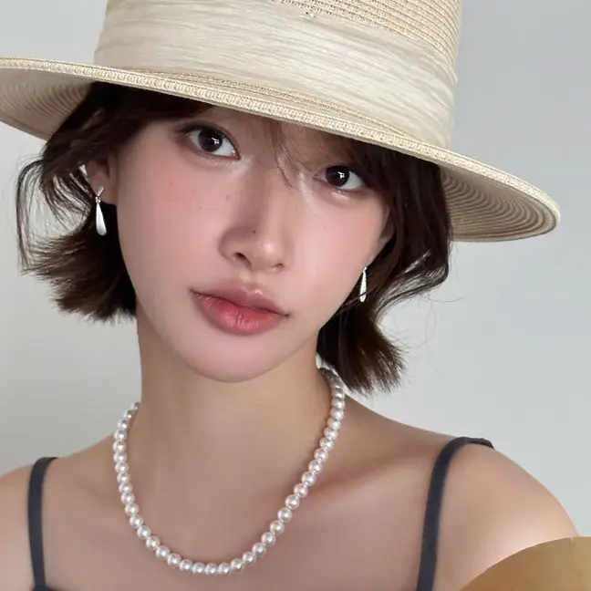 گوشواره-اشکی-نقره-ای-مینیمال3 گوشواره مینیمال نقرهای طراحی ساده